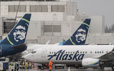 Alaska Airlines passenger accused of attacking another passenger with pens is charged in federal court