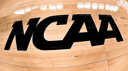 NCAA pulls ref at half due to 'background conflict'