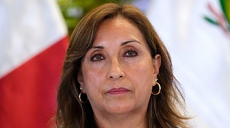 Peru's president replaces 6 ministers as she battles scandal over luxury watches