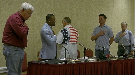 Louisiana's PSC meets in room with no American flag. How did it improvise for Pledge of Allegiance?