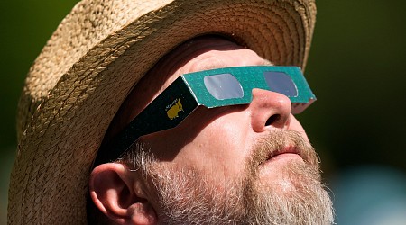 Residents in North America look to the sky for a rare total solar eclipse