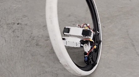A Bizarre Robot Form Factor: One Hubless Wheel and Two "Legs"