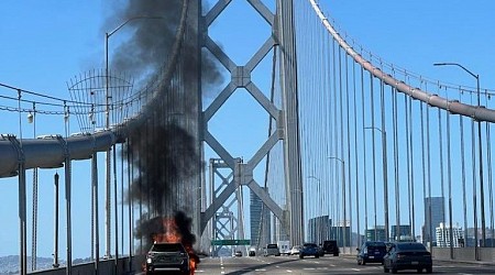 Car fire blocks four lanes in westbound direction