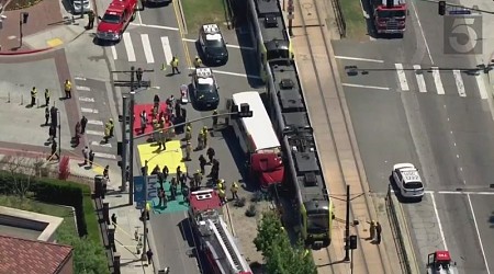Several hospitalized after bus collides with train in Los Angeles