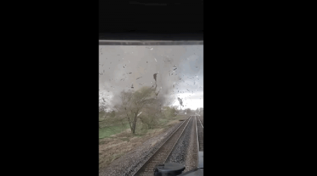 Watch Onboard As A Twister Plows Through A Freight Train