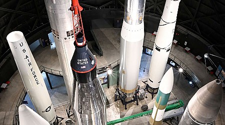 Restored Atlas rocket erected on display as Mercury astronaut's ride to orbit