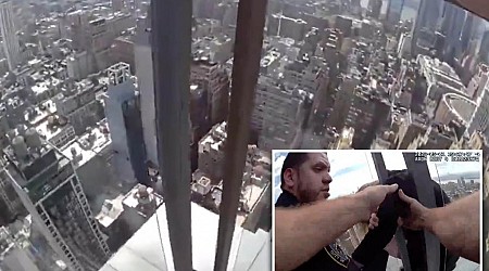 NYPD cops jump over glass barrier to save distraught woman on ledge of 54-story NYC building: video