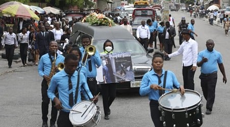 Hundreds mourn gang killings of a Haitian mission director and a young American couple