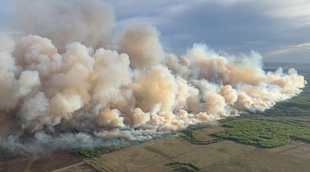 Wildfires spread across western Canada