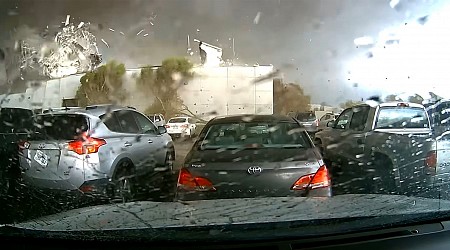 Video of a tornado in Nebraska going right over a train, filmed...