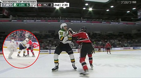 Skating Cameraman Camouflaged in White Captures Ice Hockey Fight