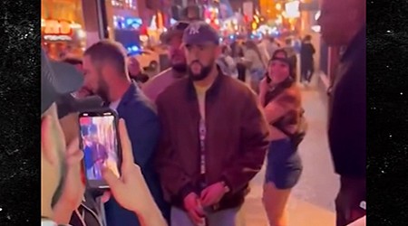 Bad Bunny Looks Miserable As He's Mobbed By Nashville Fans Taking Pics