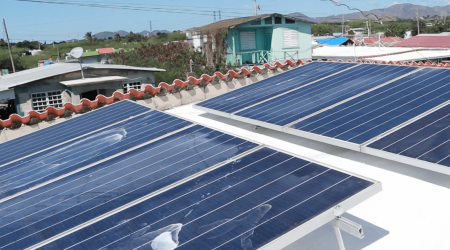 As fossil fuel plants face retirement, a Puerto Rico community pushes for rooftop solar