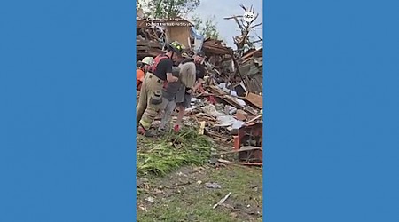 WATCH: Rescue workers pull woman from destroyed home after devastating tornado in Iowa