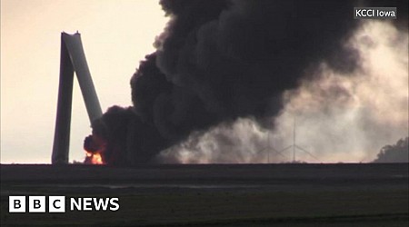 Wind turbine snapped and burning after Iowa tornado