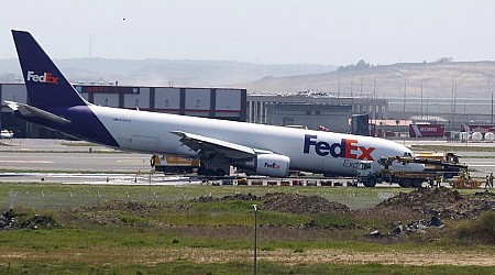 Video shows the scary moment a Boeing cargo plane skidded and threw up sparks when its landing gear failed to deploy properly