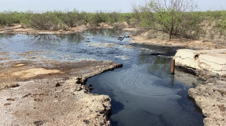 Water is bursting from another abandoned West Texas oil well, continuing a trend