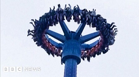 People left dangling upside down on amusement park ride