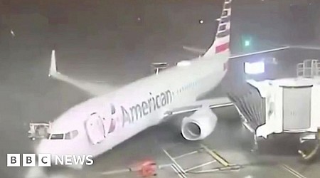 Moment winds push plane away from gate in Texas