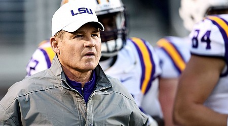 Miles sues LSU, says vacated wins kill HOF shot