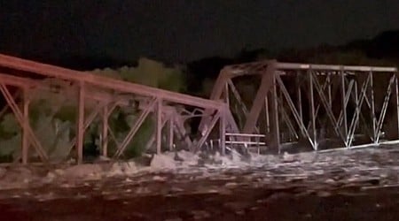 Midwest flooding collapses rail bridge, forces evacuations and kills at least 1