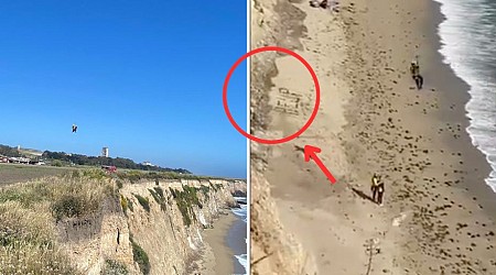 A kite surfer stranded on a remote California beach was rescued after he used rocks to spell 'HELP' on the sand