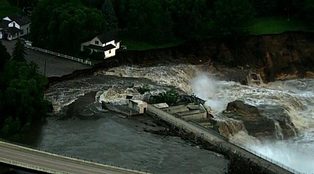 Aerial images show raging water flowing around Rapidan Dam in southern Minnesota