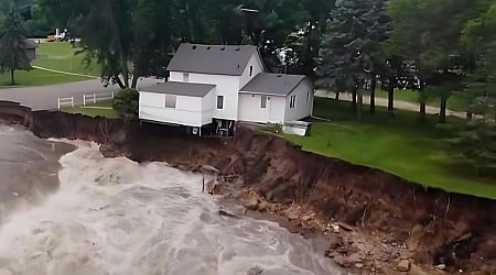 WATCH: Scary Moment Home Plunges Into Swollen Minnesota River