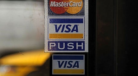 Federal judge rejects Visa, Mastercard swipe fee settlement