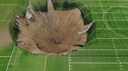 Video shows 100-foot-wide sinkhole open up under soccer field in Illinois