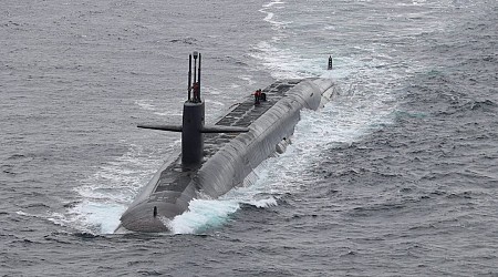 US Navy nuclear ballistic missile submarine surfaces off Norway in unusual flex as 'Doomsday' plane flies overhead