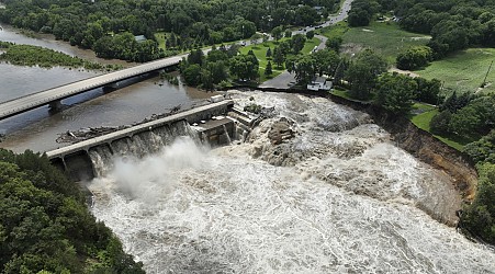 More rain is possible in the deluged Midwest as flooding kills 2 and threatens a dam