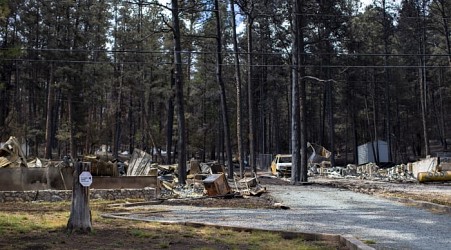 Team combs fire-ravaged New Mexico community for remains of the missing
