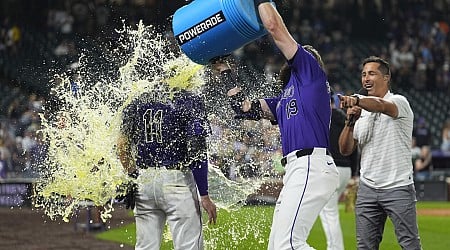 Jake Cave hits an RBI single in the 10th inning to lift the Rockies over the Brewers 8-7