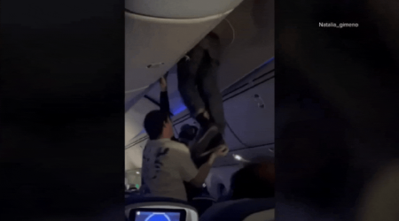 Scary Turbulence Sends Man Flying Into Overhead Bin in Viral Video