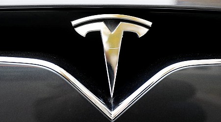 Tesla driver says his car malfunctioned and started accelerating after a head-on collision with a Jeep