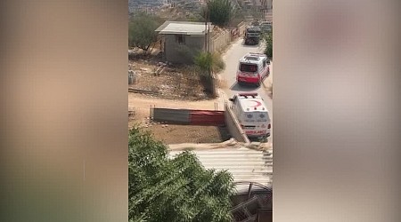 Israeli forces strap Palestinian to jeep during raid