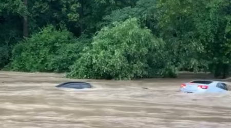 WATCH: Flooding forces cars underwater near Manchester