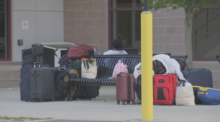 Migrant families at train station in Quincy seeking shelter