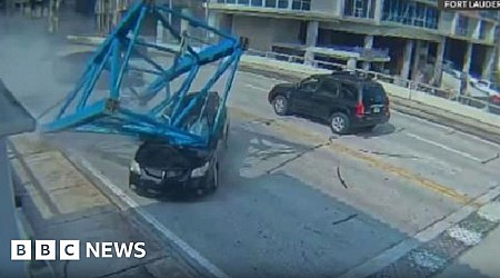 Moment woman escapes fatal crane collapse