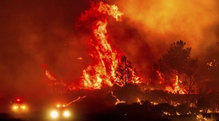 Firefighters get some help from cooler temperatures after California's largest wildfire explodes