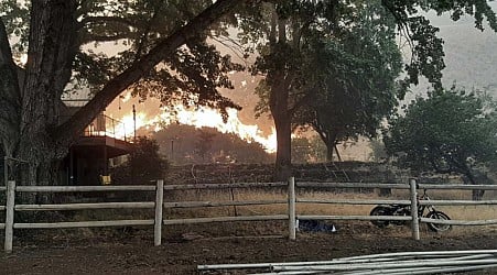 Winds and lightning strikes stoke Oregon fire, now the largest in the U.S.