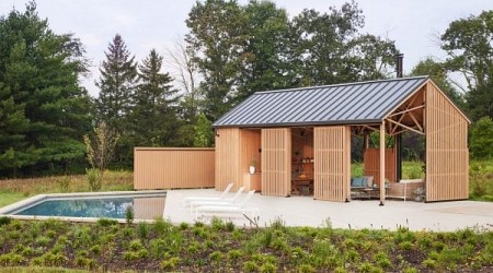 Osso Architecture models timber pool house in New Jersey on horse arena