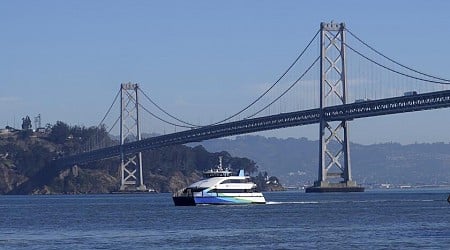 Driver fleeing car collision on Bay Bridge jumps off railing, and survives