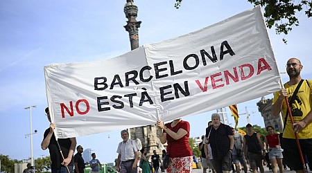 Protesters spray water guns at tourists in Barcelona as thousands rally against overtourism