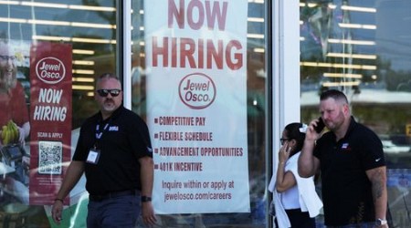 Fewer Americans filed for jobless benefits last week, but applications remain slightly elevated