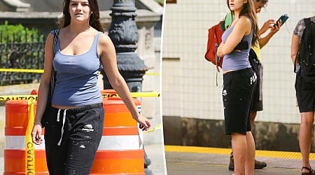 Suri Cruise, 18, beats the summer heat in NYC with tank top, cut-off sweatpants