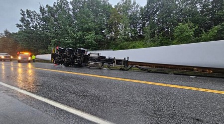 Giant wind turbine blade winds up on highway after truck hits Maine bridge