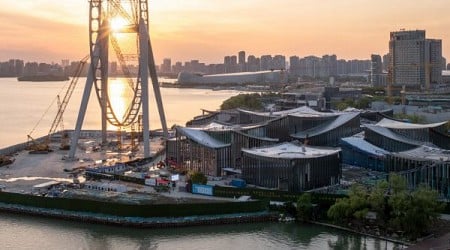 BIG tops waterfront art museum in Suzhou with swooping roof planes