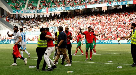 Paris Olympics organisers investigating football pitch invasion mayhem